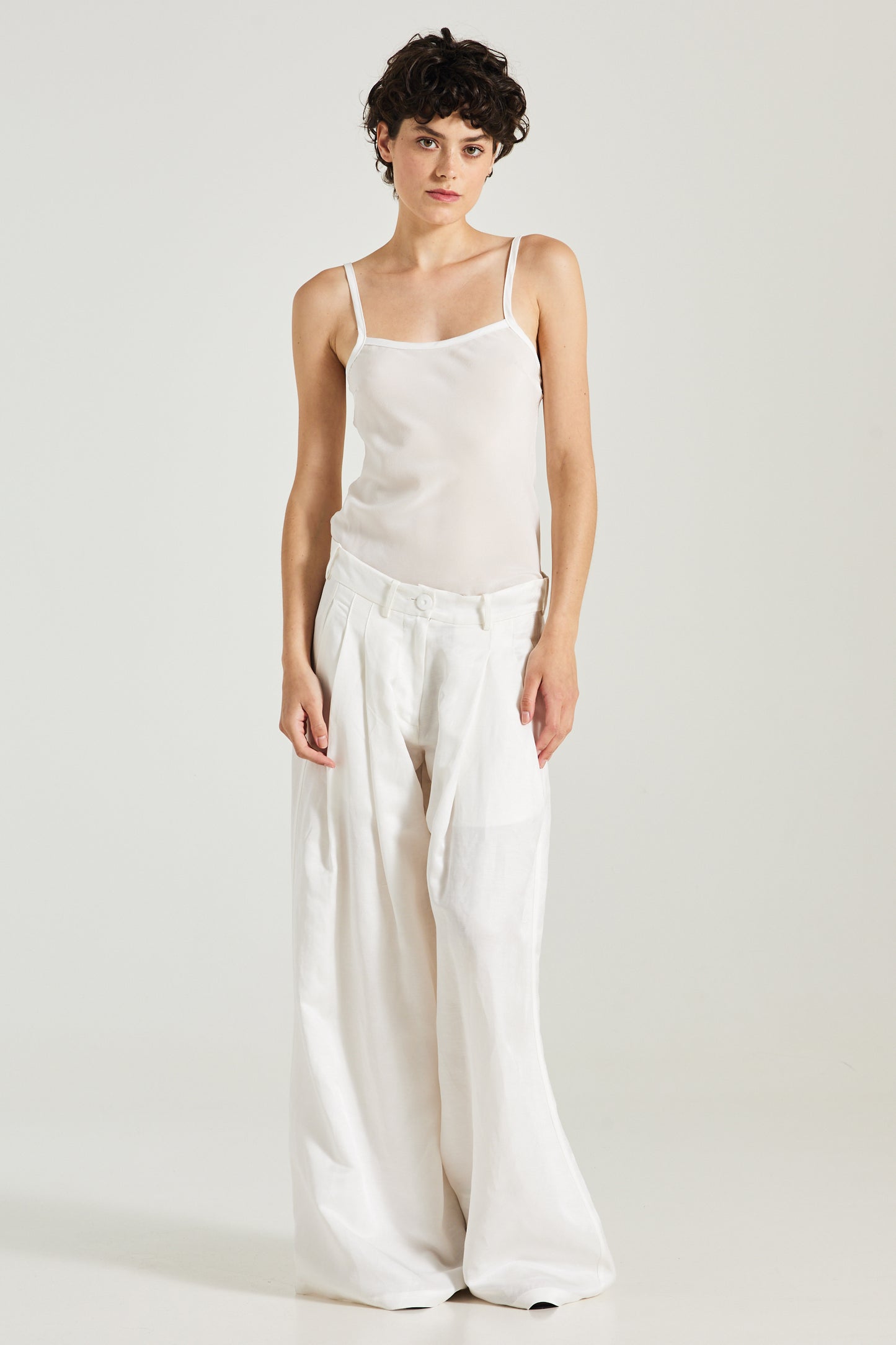 Trousers With Front Pleats And Pockets