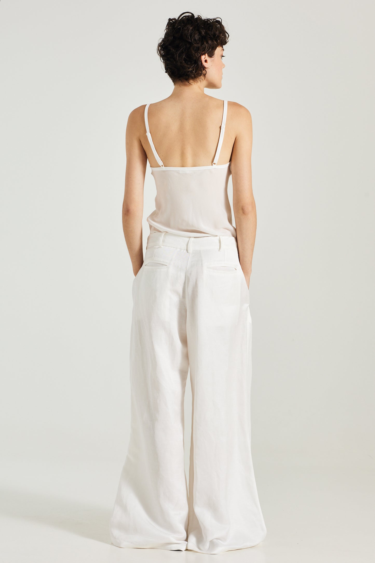 Trousers With Front Pleats And Pockets