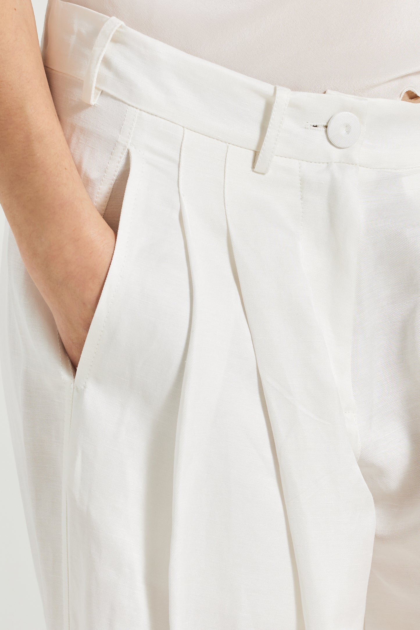 Trousers With Front Pleats And Pockets