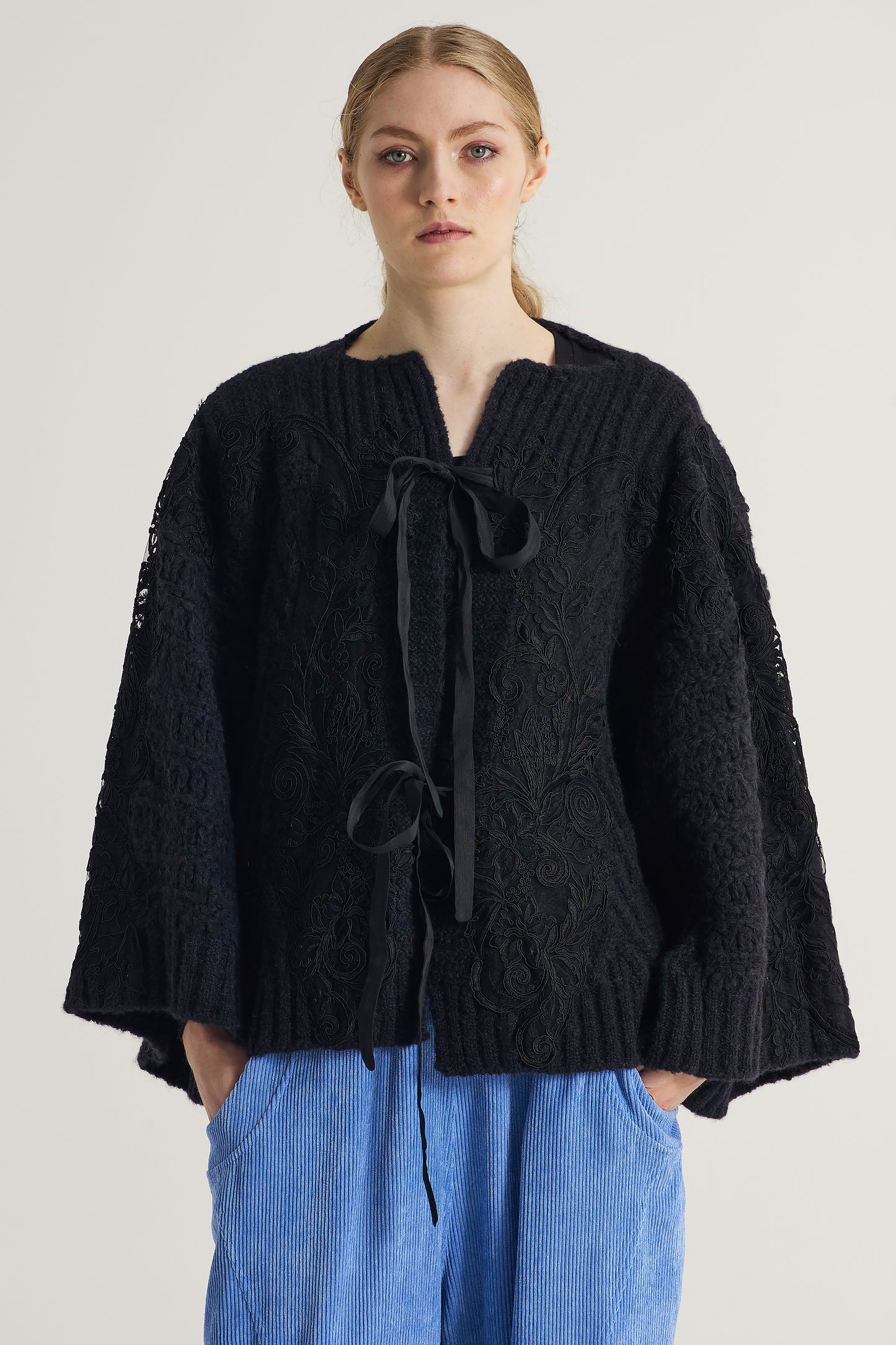 Wool Sweater With Lace Details And Front Ribbons