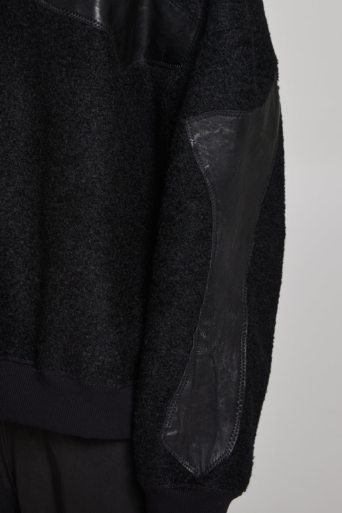 Oversized blouse with leather