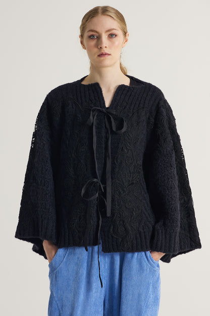Wool Sweater With Lace Details And Front Ribbons