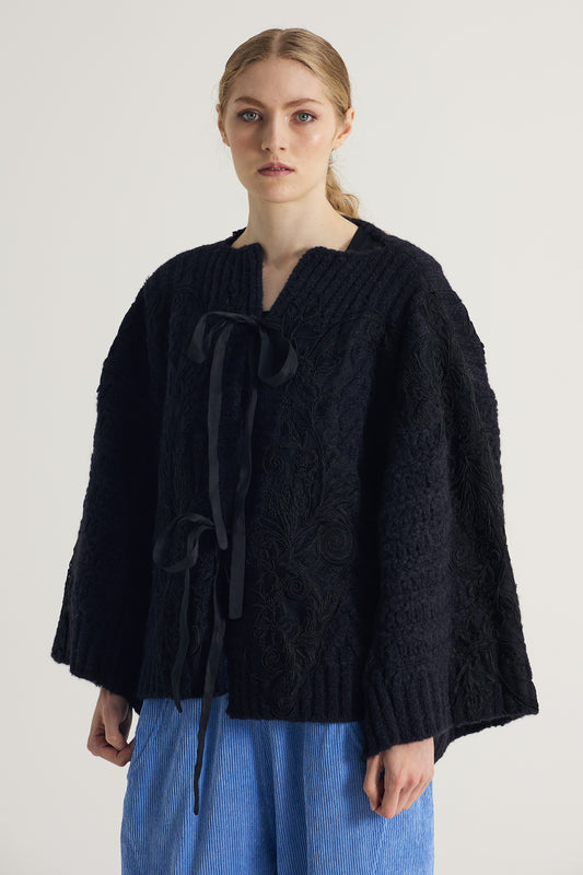 Wool Sweater With Lace Details And Front Ribbons