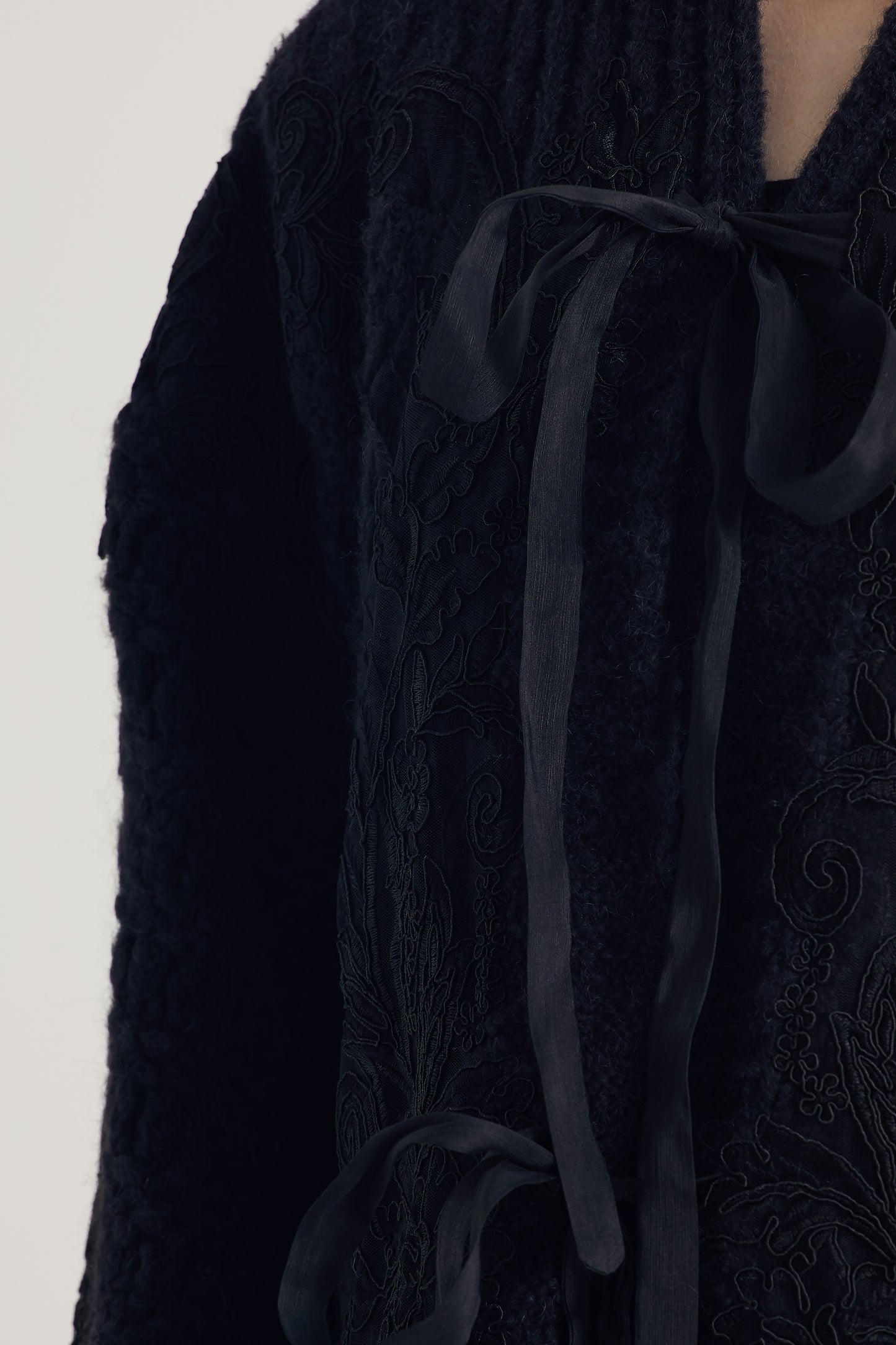 Wool Sweater With Lace Details And Front Ribbons