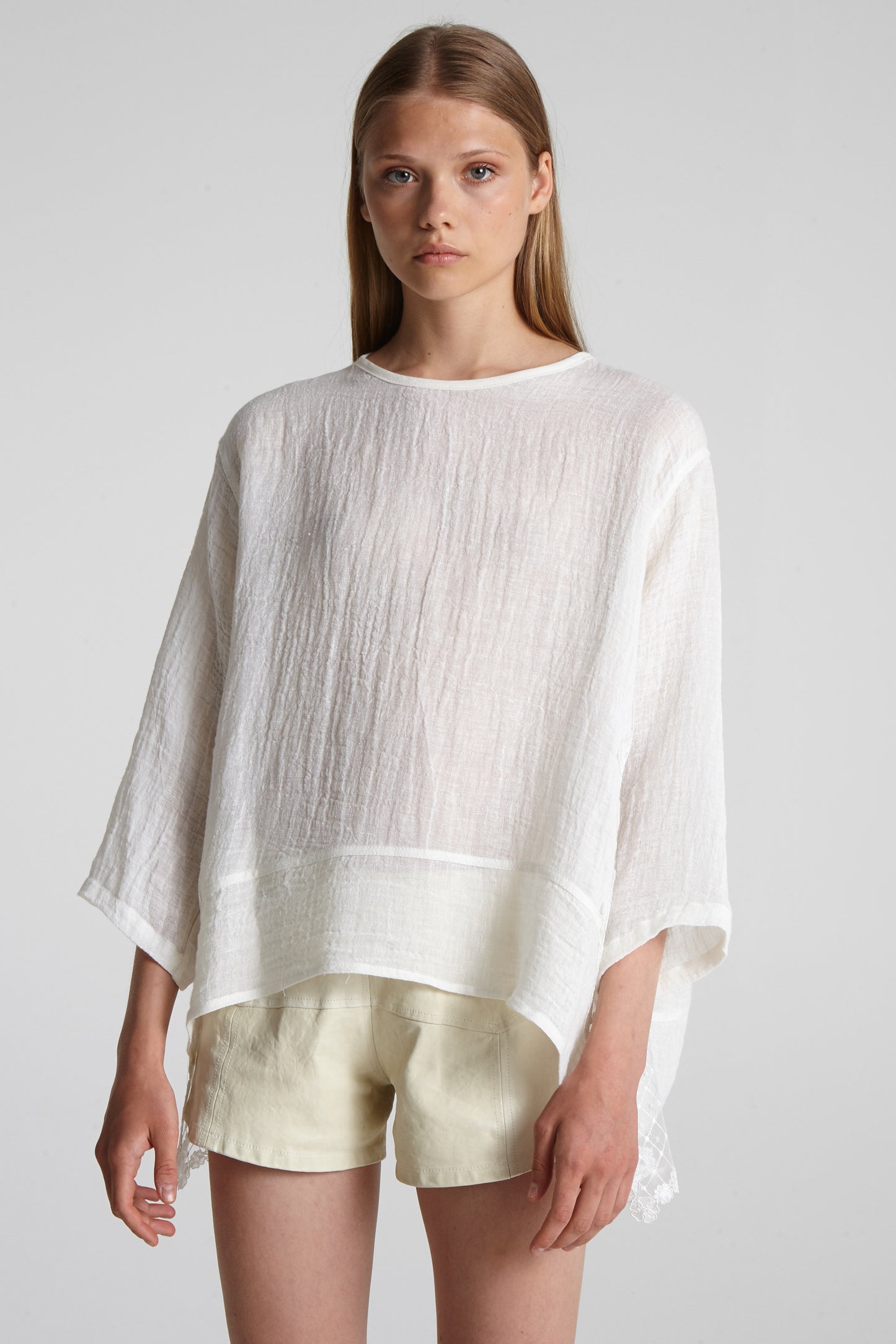 Wide linen blouse with lace on the sides