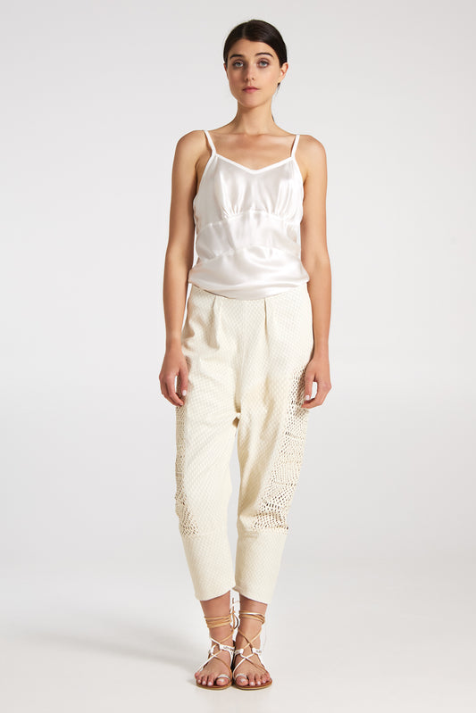 Perforated leather trousers