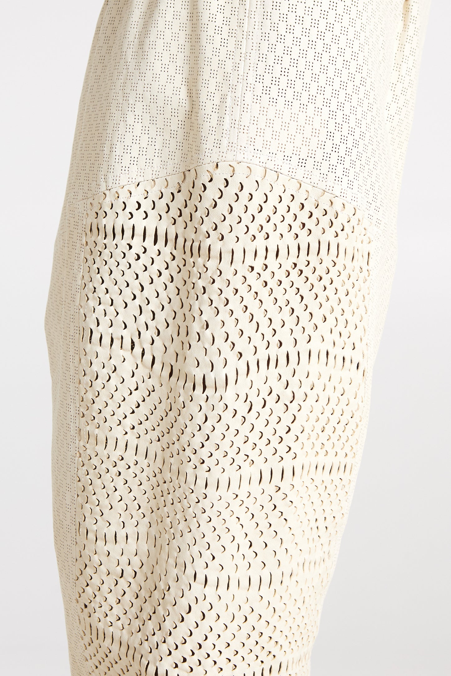 Perforated leather trousers